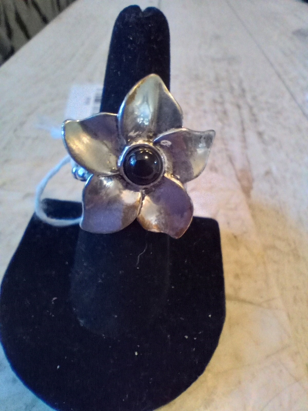 Silver-tone Flower Ring with Black Center Stone